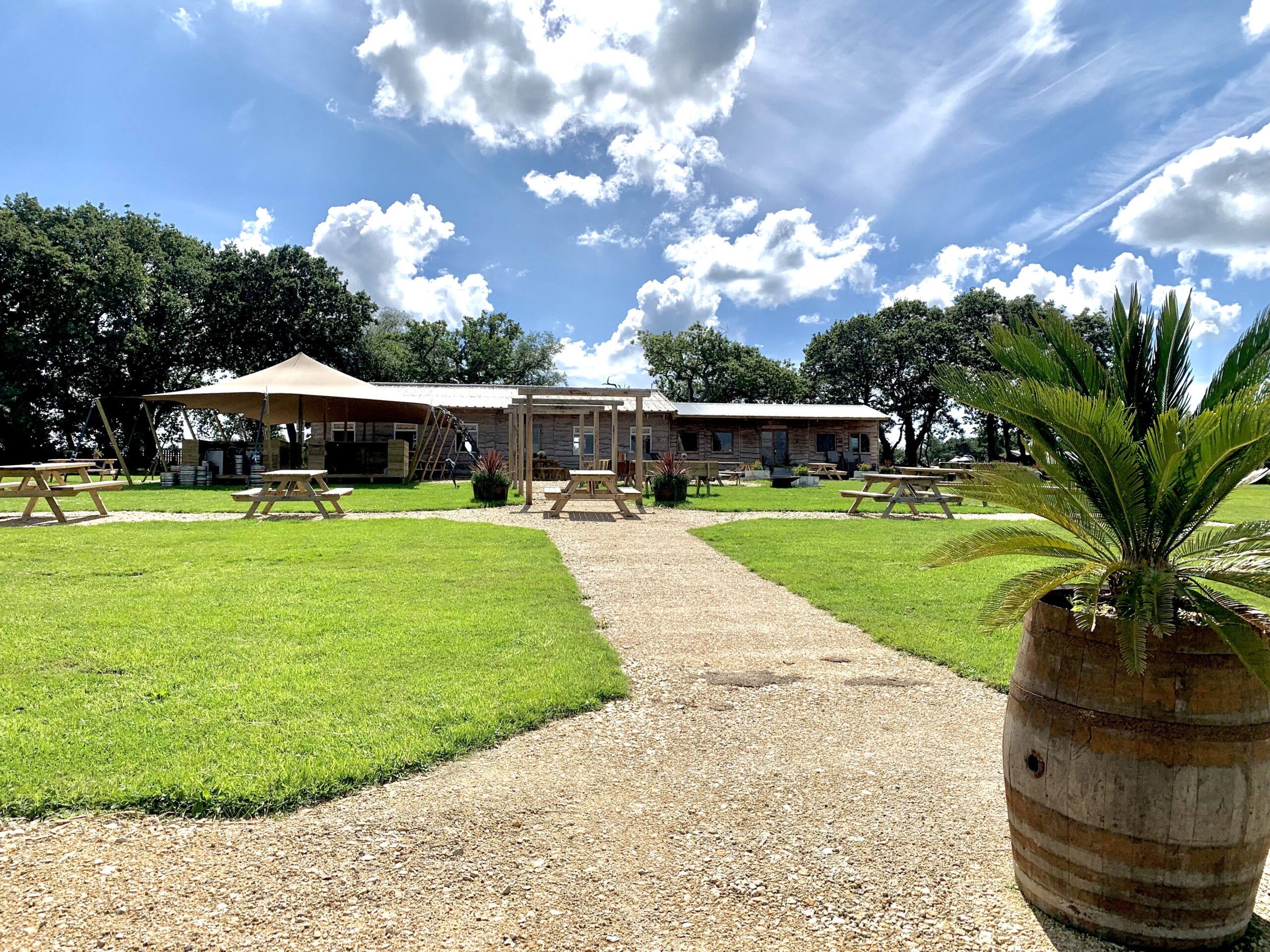 Blue skies, manicured grass around our on site cafe